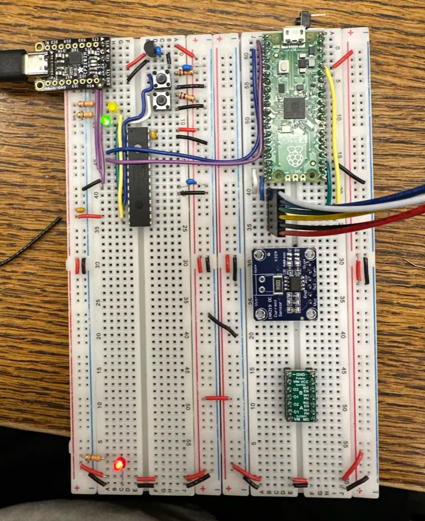 Breadboard build with PIC32, Pico 2, INA219, and H-bridge